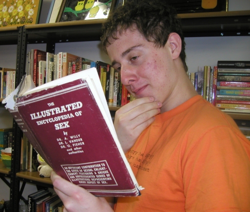 rob_with_book_o_sex.jpg