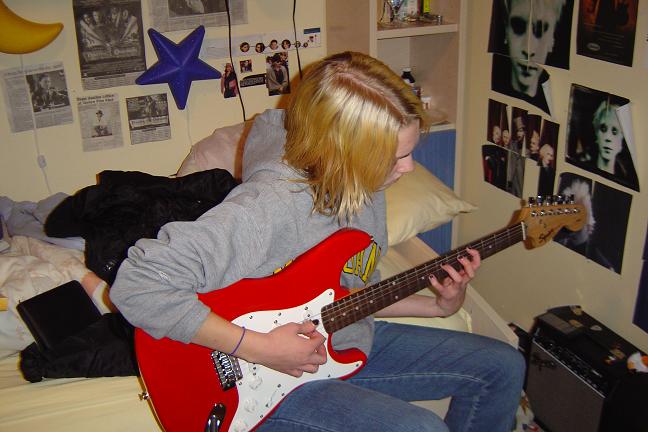 keri - playing guitar.JPG